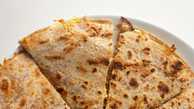 Top down view of quesadillas on a plate