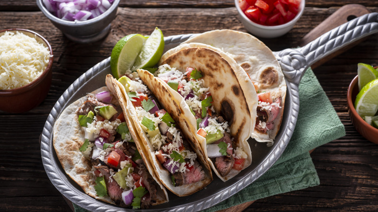 A plate of loaded beef tacos