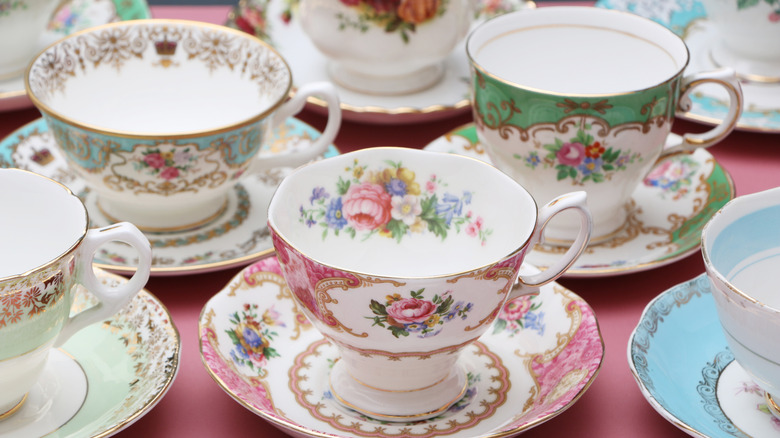 Assorted vintage teacups on saucers