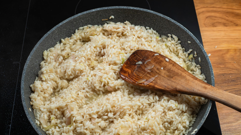 Rice cooking in a pan.