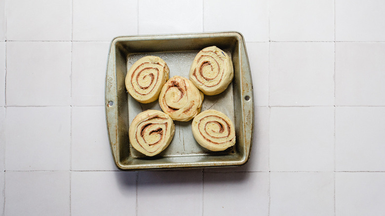 Tray of raw cinnamon buns