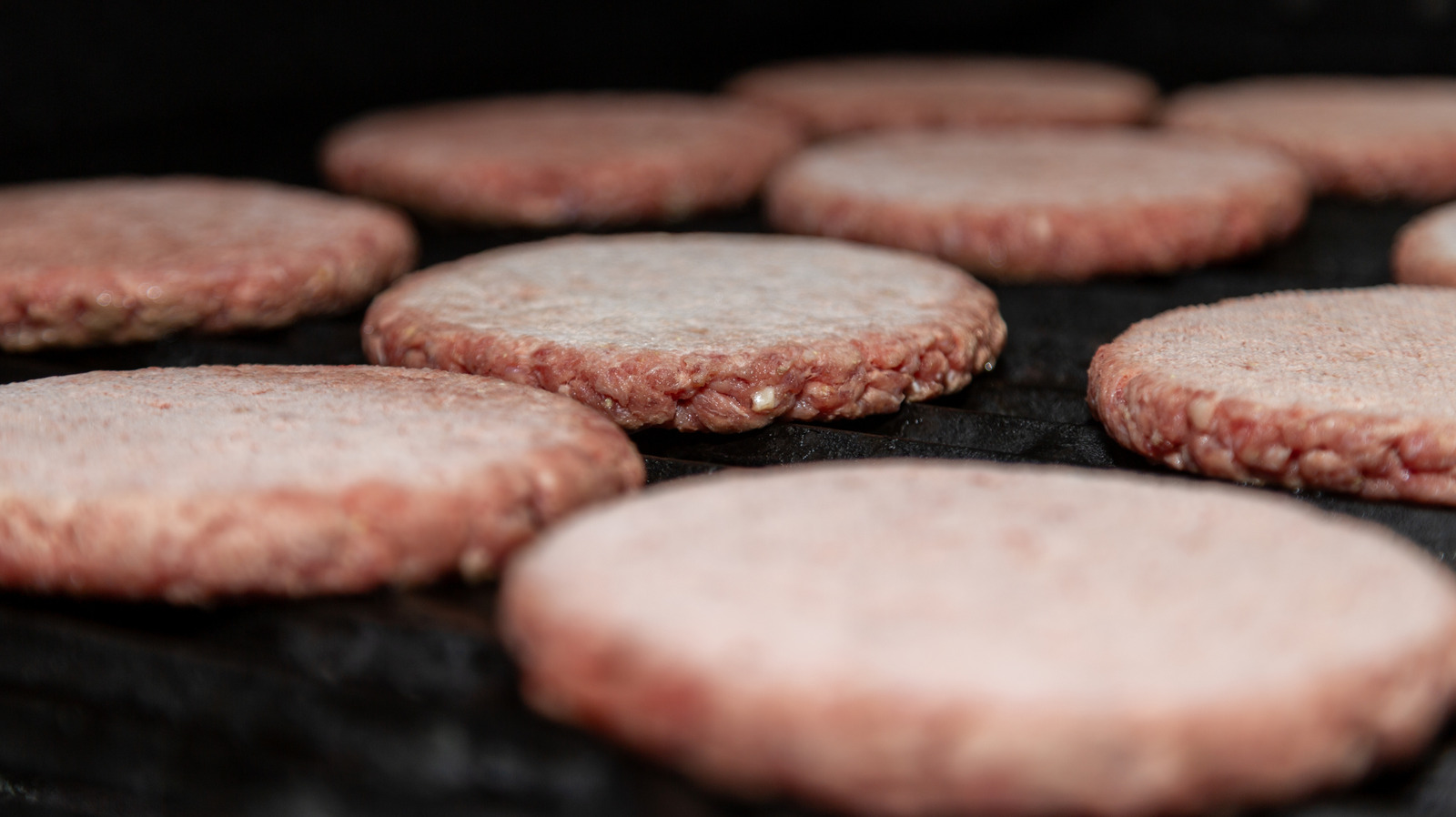 Transform The Flavor Of Frozen Burgers With This Umami Ingredient - Tasting Table