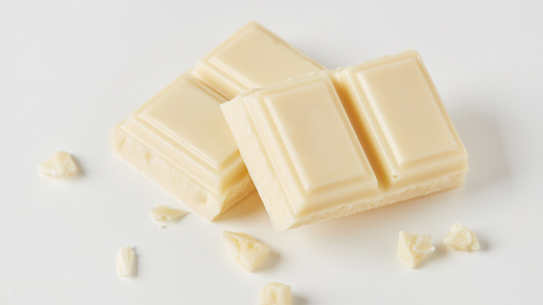 White chocolate squares on a white surface