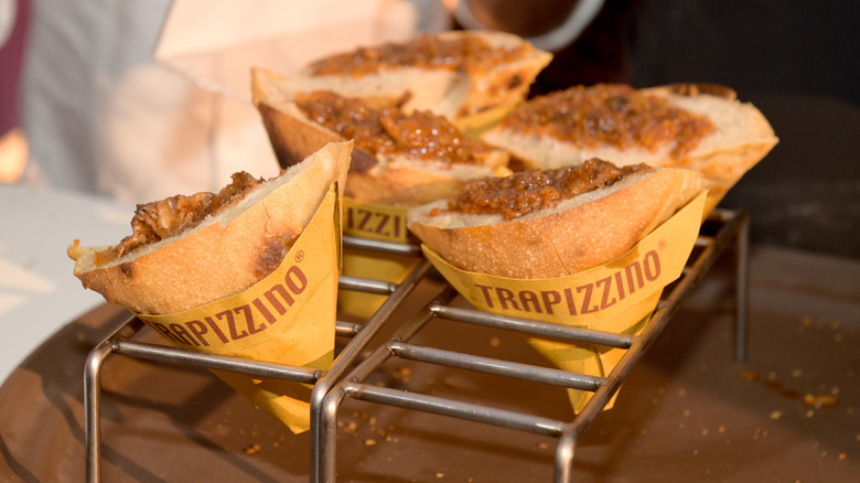 Trapizzino sandwich displayed in wrappers
