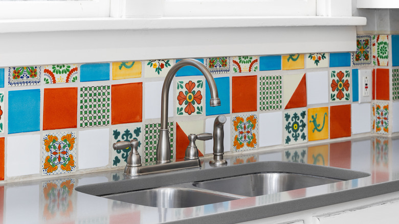 printed backspash behind stainless steel sink