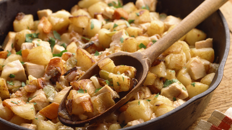 close up of breakfast potatoes in a skillet