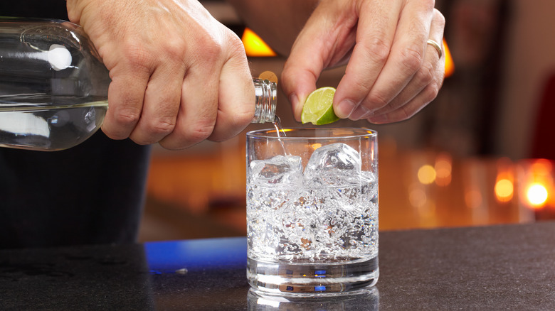 bartender making vodka soda