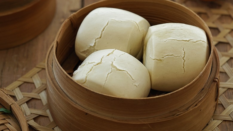 mantou buns in steamer basket