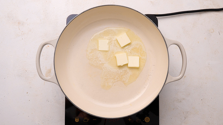 butter melting in a skillet