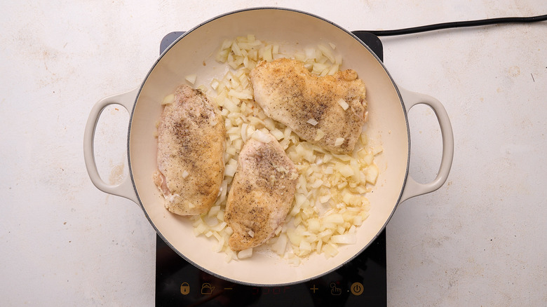 softening onions in a skillet