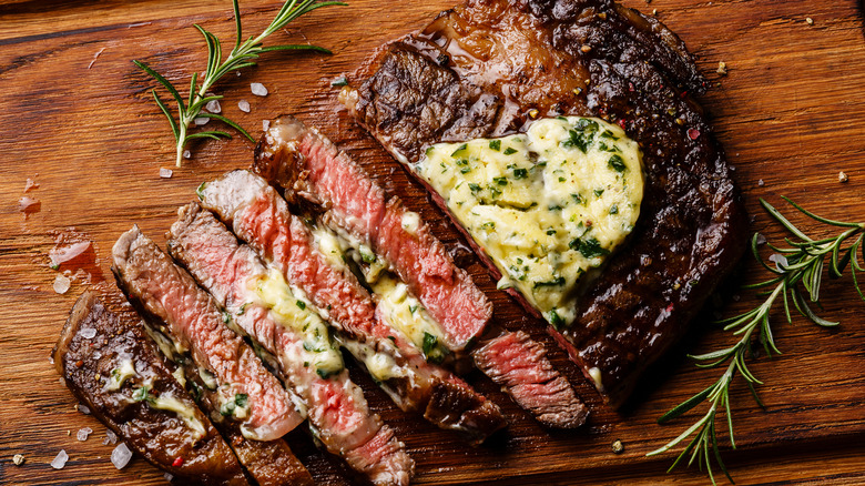 Ribeye steak with herbed butter 