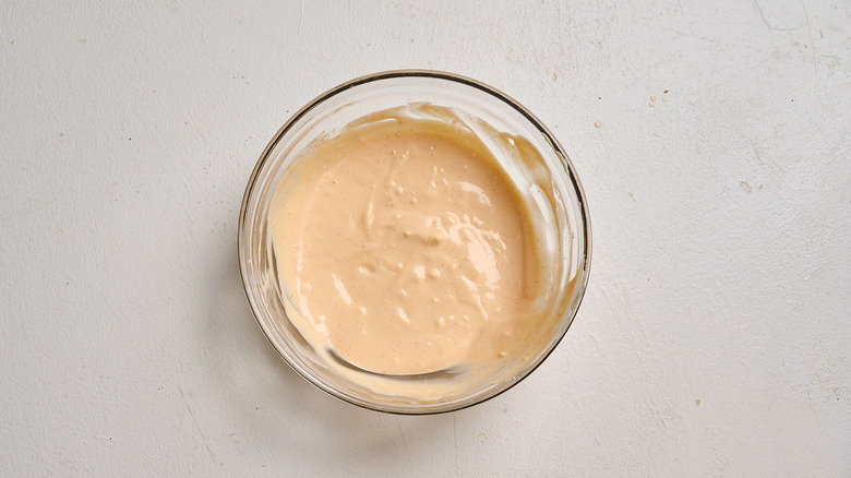 sriracha mayo ingredients combined in a bowl