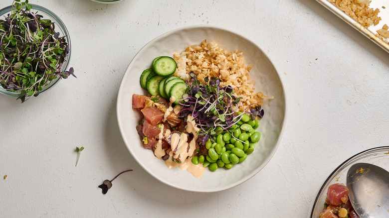 assembled tuna crispy rice bowl on a table