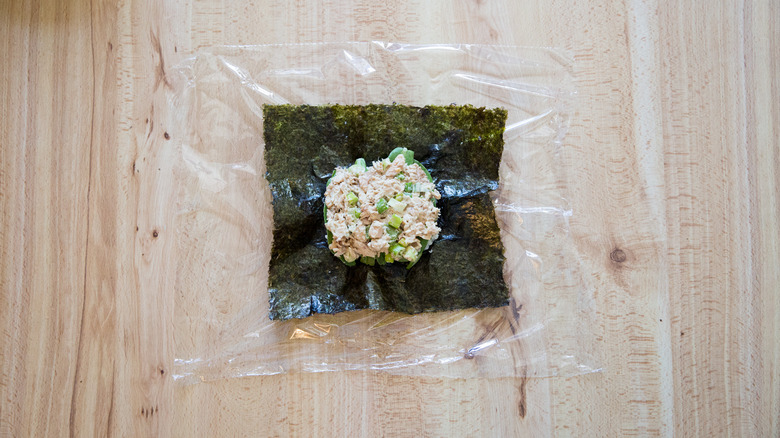 partially-made onigirazu on table
