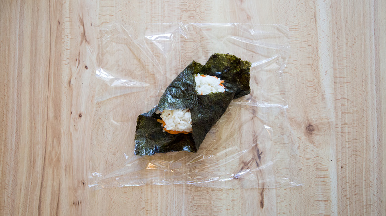 partially-made onigirazu on table