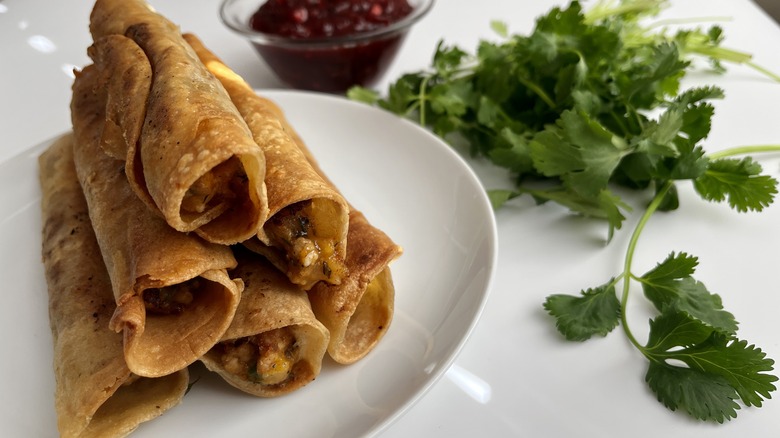 Turkey taquitos with parsley and cranberry salsa