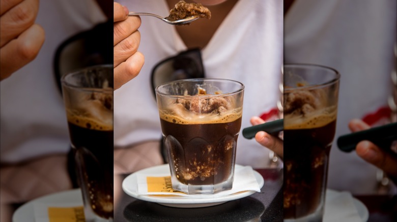 Person taking spoonful coffee granita
