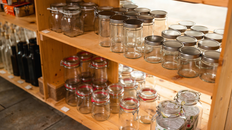 shelves of  empty Mason jars