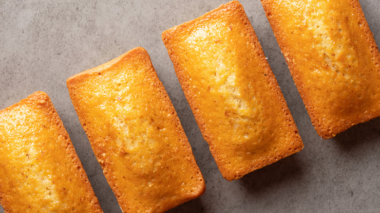 various pound cakes on a grey surface