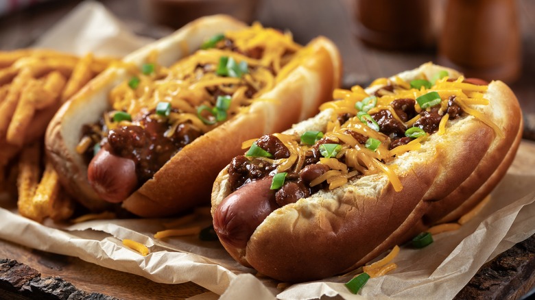 Two chili cheese hot dogs