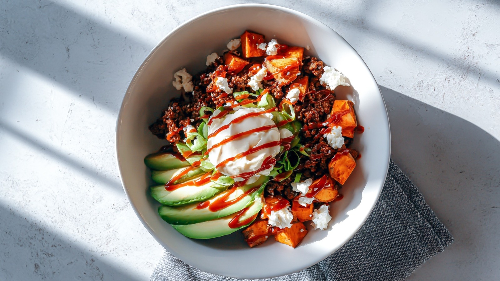 Turn These Honey-Roasted Sweet Potatoes Into Hot Honey Ground Beef Bowls - Tasting Table