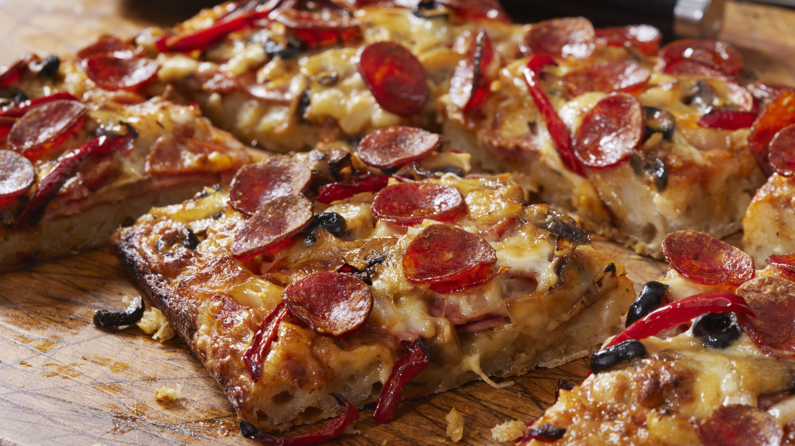 Turning Frozen Pizza Into A Detroit-Style Deep-Dish Is Worth The Easy Extra Steps