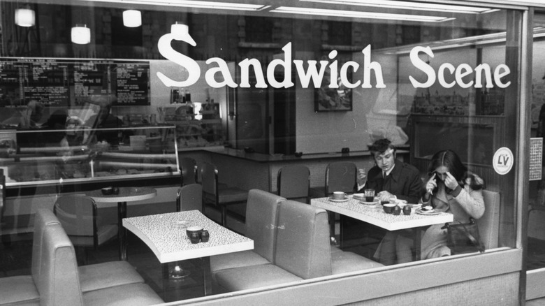 old black and white image of an eatery called sandwich scene
