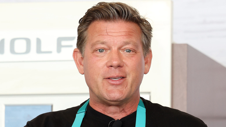 Tyler Florence in apron and black shirt