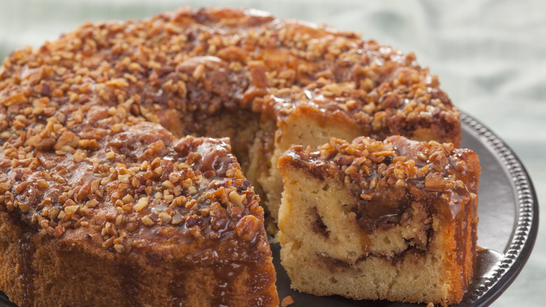 Coffee cake and slice on a glass plate