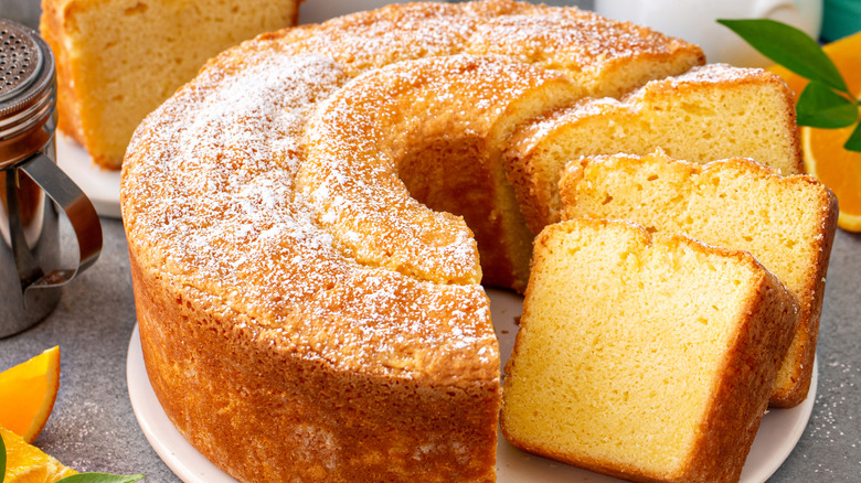 Citrus pound cake and slices on a white tray