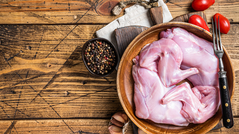 Uncooked rabbit meat in bowl