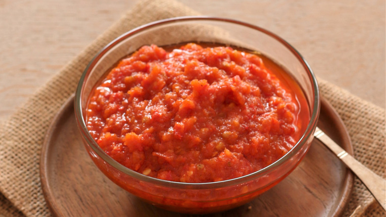 Glass bowl filled with sambal sauce