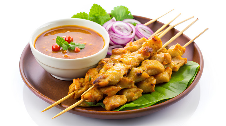 Grilled pork satay skewers with satay sauce