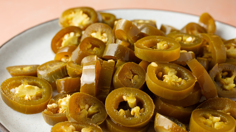 Pickled jalapeño slices on plate