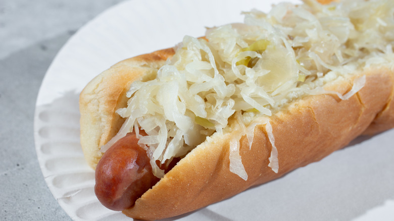 Hot dog topped with sauerkraut