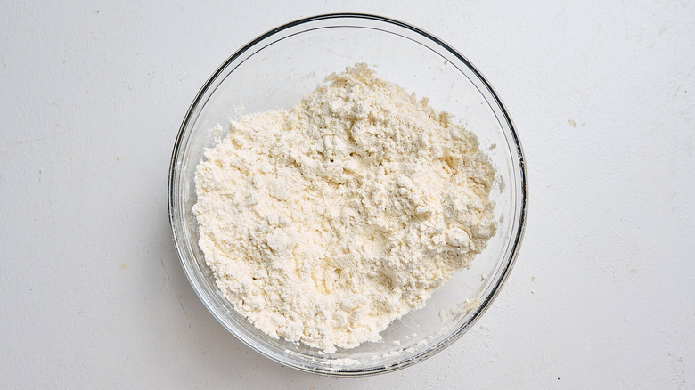 combining biscuit ingredients in a bowl