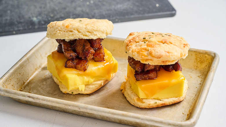 Pork belly piled onto egg sandwich