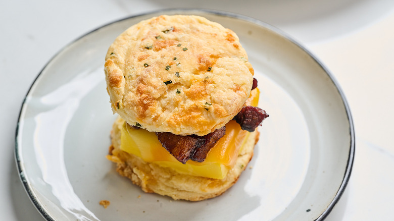 egg and bacon sandwich on a plate