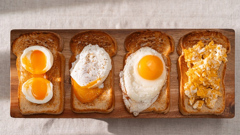 Different types of eggs on toast