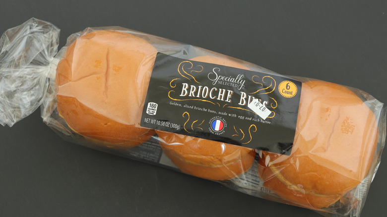 Specially Selected brioche rolls on black surface