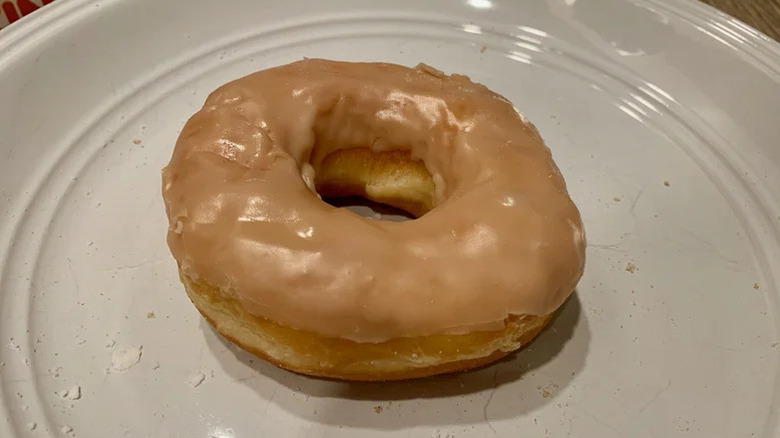 Maple frosted donut on a plate