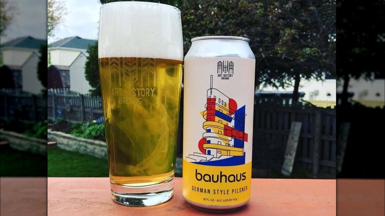 A glass and can of Bauhaus pilsner