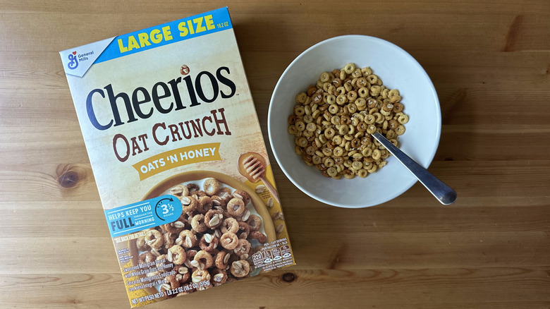 Cheerios Oat Crunch Oats 'N Honey in a bowl and box