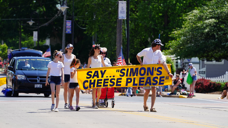 People walking in the parade at the Great Wisconsin Cheese Festival in Little Chute