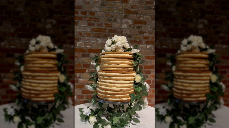 Wedding cake made from cookies, with floral decorations