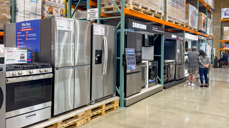 A line of Costco kitchen appliances at the warehouse store