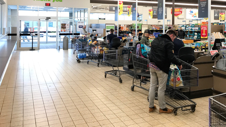Aldi checkout counters with bagging counters to the left.