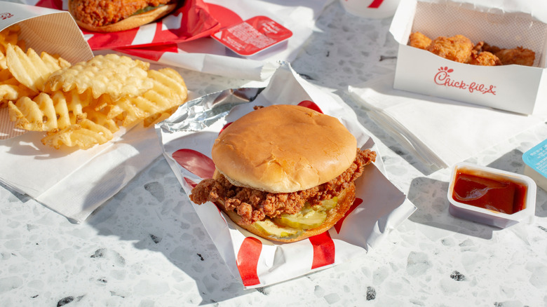 Chick-fil-A chicken sandwich with fries and dipping sauce