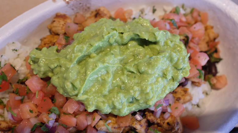 Guacamole on Chipotle bowl close up