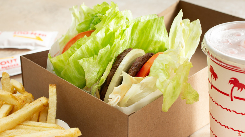 A view of an In-N-Out Burger meal with raw onion
